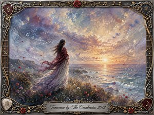 A solitary woman stands on a windswept seaside cliff, gazing toward a glowing sunrise over restless water. Flowing cranberry fabric, wildflowers, drifting petals, and musical notes animate the scene. Soft blues, lavender, peach, and gold create a hopeful, reflective mood, framed by ornate metallic strings, roses, guitar details, and elegant script.
