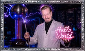 A charismatic scientist commands a dazzling electrical laboratory, gripping a conductive staff crowned with crackling violet arcs while presenting a radiant pink Hello World neon sign. Static-charged hair, a white lab coat, black shirt and tie, metallic machinery, and an ornate engraved chrome frame complete the dramatic futuristic exhibition portrait.