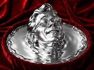 A polished chrome bust rises from a deep pool of frozen liquid mercury, surrounded by rich crimson velvet. The head tilts back with a warm, toothy smile and an exaggerated raised eyebrow, while smooth sculpted-metal hair and reflective glasses complete the surreal portrait. Rippling silver reflections create a luxurious, dreamlike atmosphere.