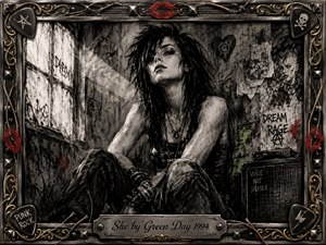 A solitary punk-styled woman sits against a battered graffiti-covered wall, rendered in deep, feathered charcoal with gritty monochrome textures. Harsh side lighting shapes her defiant, introspective expression, while muted red accents punctuate the darkness. An ornate rock-inspired frame of metal, guitar strings, picks, studs, and gold inlay completes the rebellious composition.