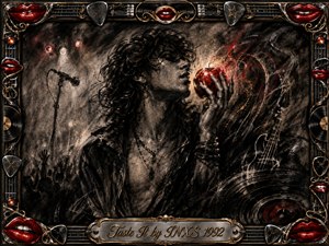 A sensual rock figure emerges from deep feathered charcoal, lifting a glowing red apple toward parted lips amid smoky stage lights, a microphone, crowd silhouettes, and abstract guitar forms. Black, gray, red, and gold dominate the dramatic composition, framed by ornate chrome, lips, records, strings, and an engraved title plate.