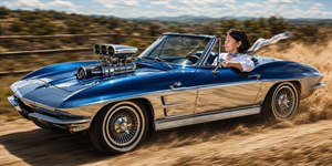 Command the open road in this striking custom Corvette convertible, finished in metallic blue and mirror-bright chrome. A polished supercharger crowns the hood while dust, speed, and motion ignite the scene. With effortless confidence, flowing scarf, and classic American power, this artwork celebrates freedom, style, and unstoppable adventure on canvas.