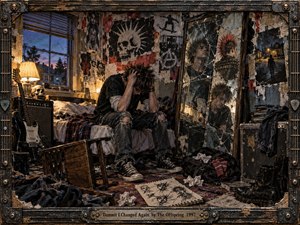 A distressed young punk sits hunched on a cluttered bed in a dim bedroom, surrounded by torn posters, instruments, sketches, and a shattered mirror reflecting fractured identities. Warm amber lamplight contrasts with cool blue dusk, while gritty mixed-media textures, scuffed wood, metal details, and a weathered frame deepen the restless, introspective mood.