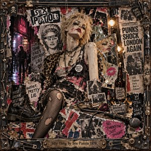 A defiant blonde punk lounges amid torn posters, shattered mirrors, cigarette butts, and rebellious graffiti in a gritty 1970s London club. Dirty pinks, rusty browns, and deep blacks glow beneath neon and exposed bulbs. Dense mixed-media collage, distressed photographs, safety pins, and an industrial metal frame capture chaotic glamour and reckless attitude.