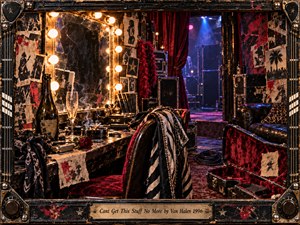 A worn backstage dressing room glows with amber vanity bulbs, crimson velvet, smoky shadows, and cool blue stage light. A striped jacket, open guitar case, rose, glassware, cables, and distressed posters suggest vanished rock excess. Rich mixed-media textures, weathered surfaces, chrome details, and cinematic depth create nostalgic, restless melancholy.